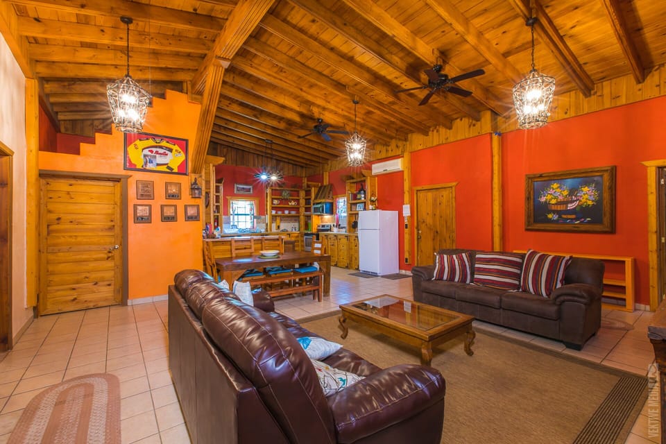 Open space living room-dining room and kitchen. Large pantry room