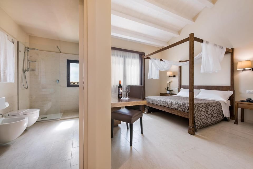 Junior Suite | Premium bedding, minibar, in-room safe, desk