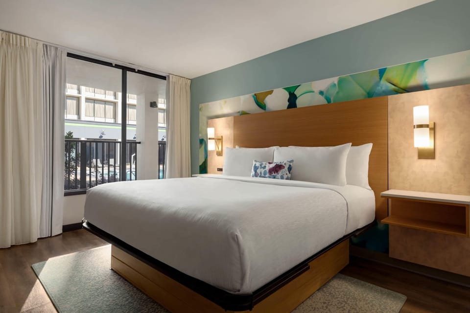 Suite, 1 King Bed, Non Smoking, Pool View | Premium bedding, pillowtop beds, in-room safe, individually decorated