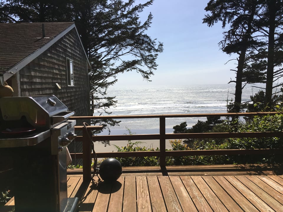 View of the beach from the second deck with BBQ
