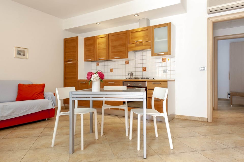 Apartment, 1 Bedroom | Private kitchen | Full-size fridge, stovetop