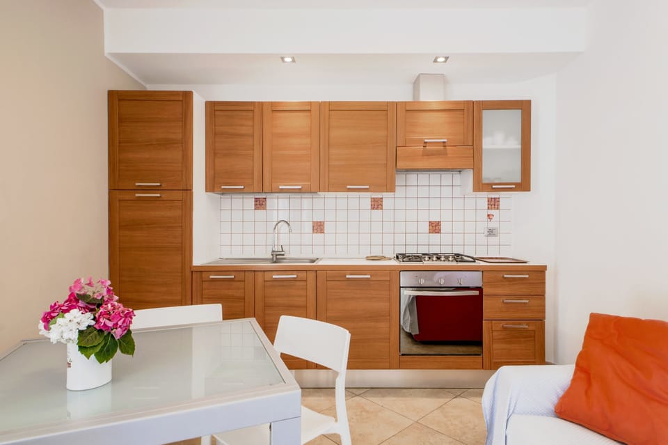 Apartment, 2 Bedrooms | Private kitchen | Full-size fridge, stovetop