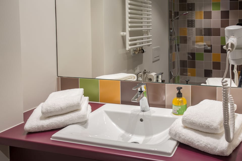 Shower, free toiletries, hair dryer, towels