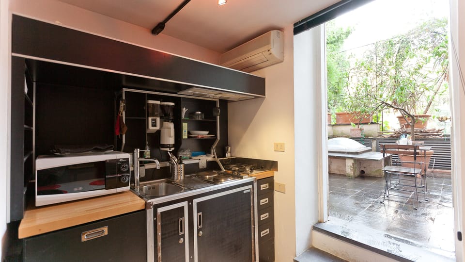 Apartment, 1 Bedroom | Private kitchenette | Fridge, stovetop, coffee/tea maker, cookware/dishes/utensils