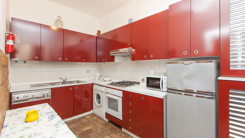 Apartment, 2 Bedrooms | Private kitchen | Full-size fridge, microwave, oven, stovetop