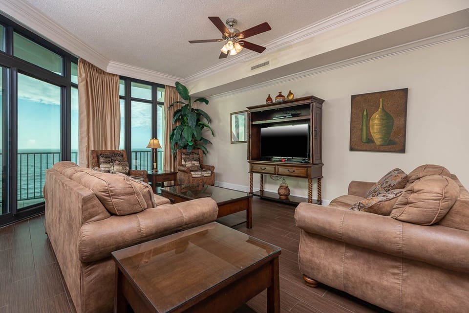 Relax on the plush sofas with a queen sleeper while enjoying stunning views of the coast