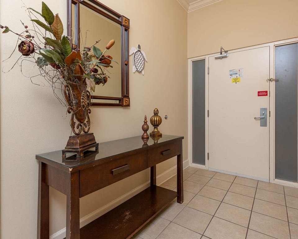 Welcome home as you step into this inviting entryway, adorned with elegant decor that sets the tone for your stay