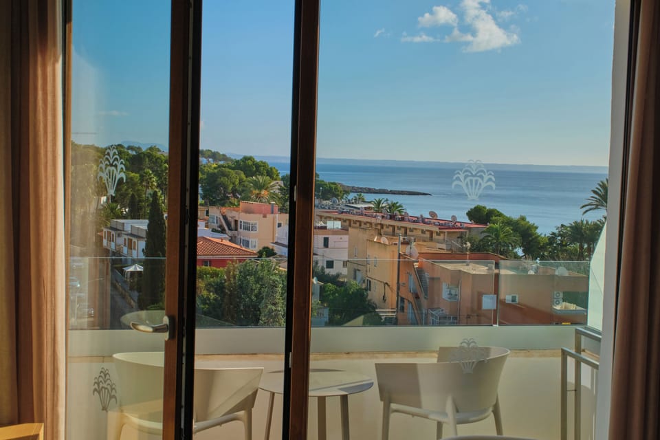 Superior Double Room, Balcony, Partial Sea View (Newly Refurbished) | Down comforters, minibar, individually decorated, individually furnished