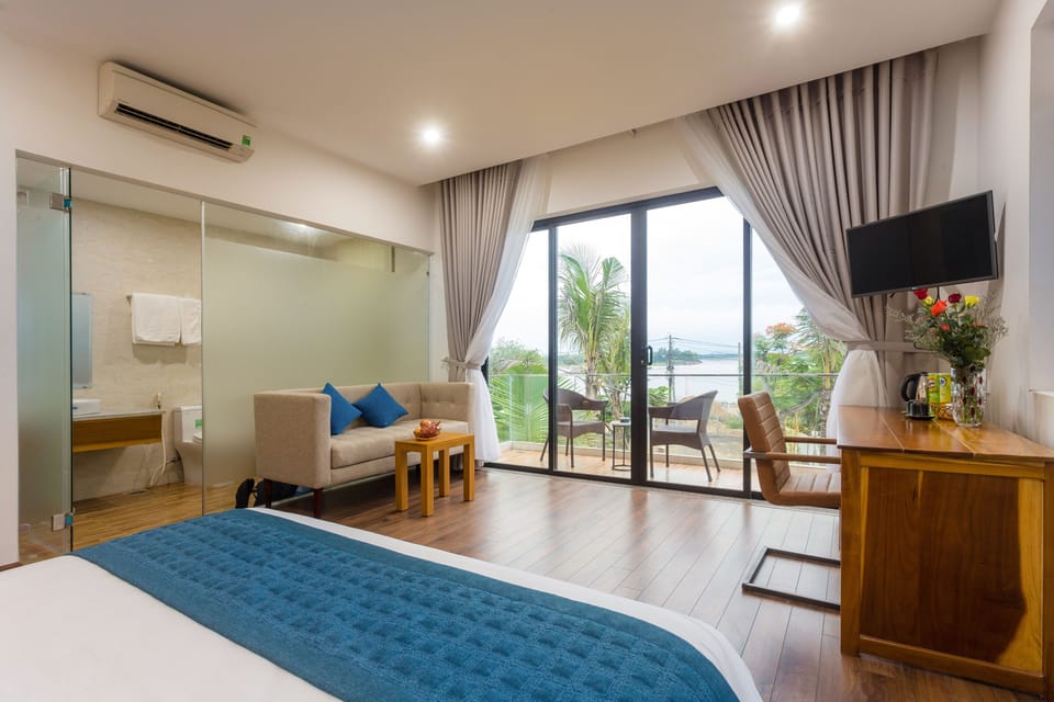 Deluxe Double Room, River View | Premium bedding, minibar, in-room safe, desk