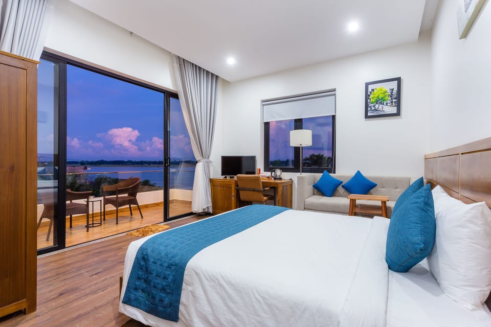 Deluxe Double Room, River View | Premium bedding, minibar, in-room safe, desk