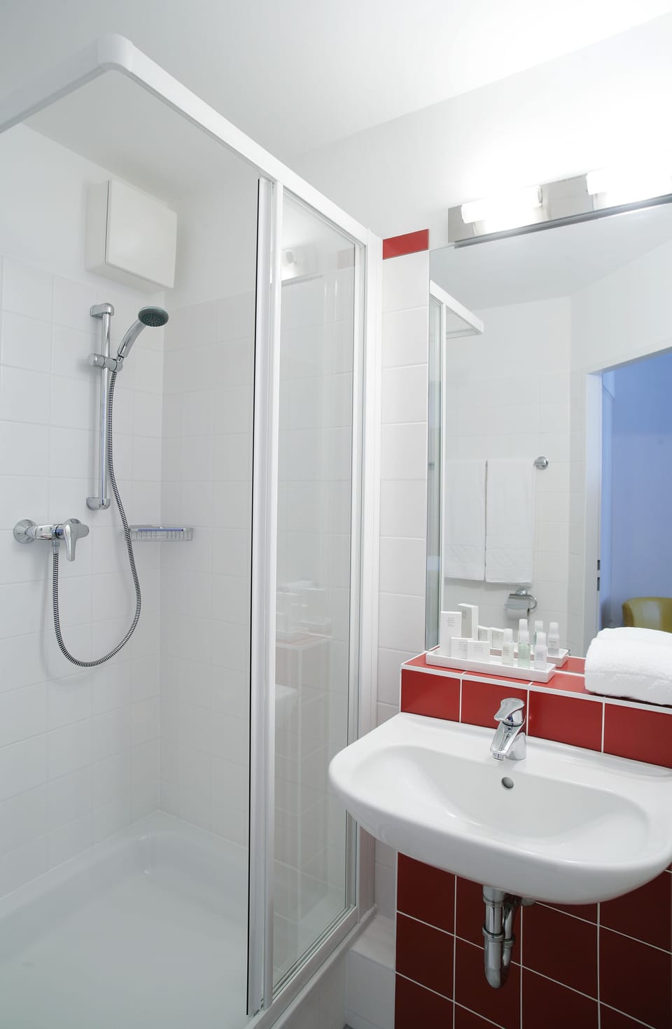 Shower, free toiletries, hair dryer, towels