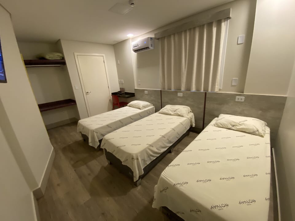 Triple Room | Minibar, individually furnished, desk, laptop workspace