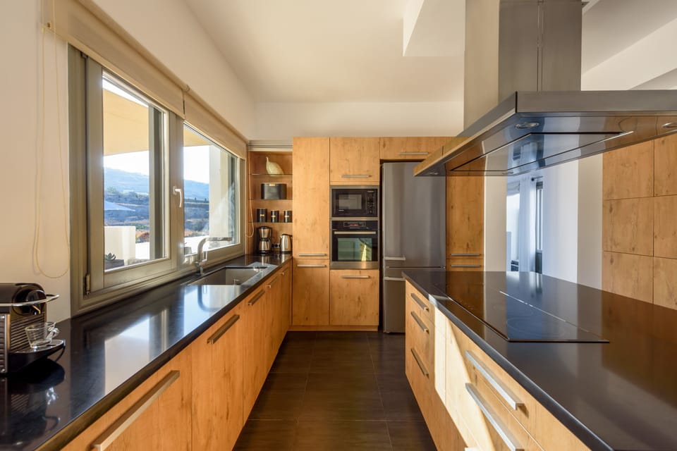 Villa, 4 Bedrooms, Sea View | Private kitchen | Full-size fridge, microwave, oven, stovetop