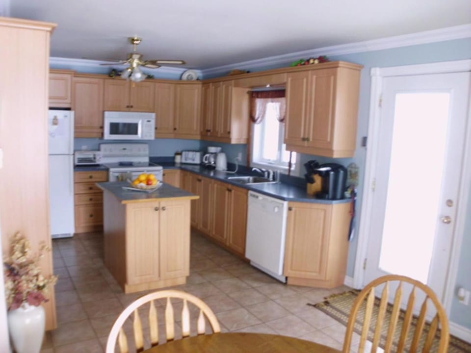Full-size fridge, microwave (on request), oven, stovetop