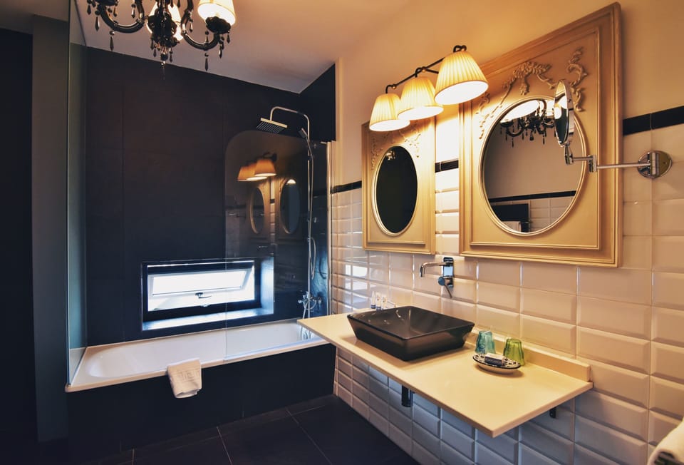Shower, free toiletries, hair dryer, slippers