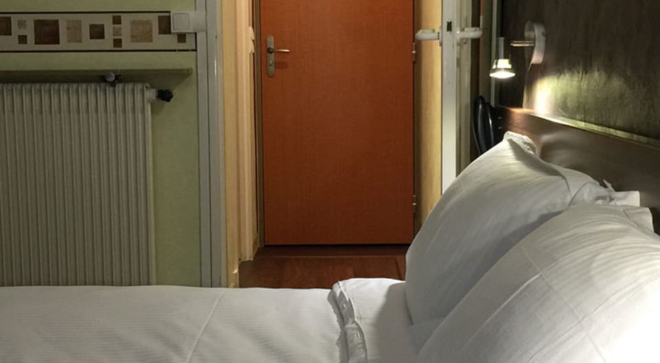 Family Room | Premium bedding, individually decorated, desk, soundproofing