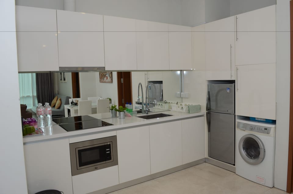 Exclusive Apartment, 2 Bedrooms, 1 Bathroom | Private kitchen | Full-size fridge, microwave, stovetop, cookware/dishes/utensils