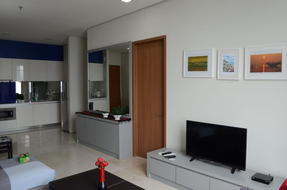 Exclusive Apartment, 2 Bedrooms, 1 Bathroom | Living area | 40-inch flat-screen TV with cable channels, TV
