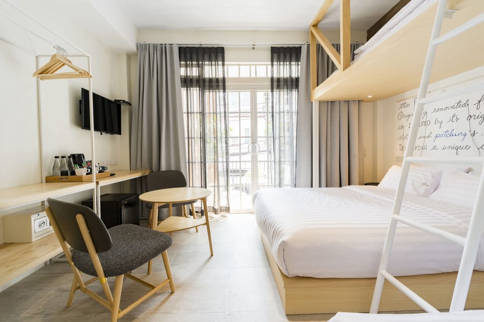 Family Room | Minibar, in-room safe, blackout drapes, free WiFi