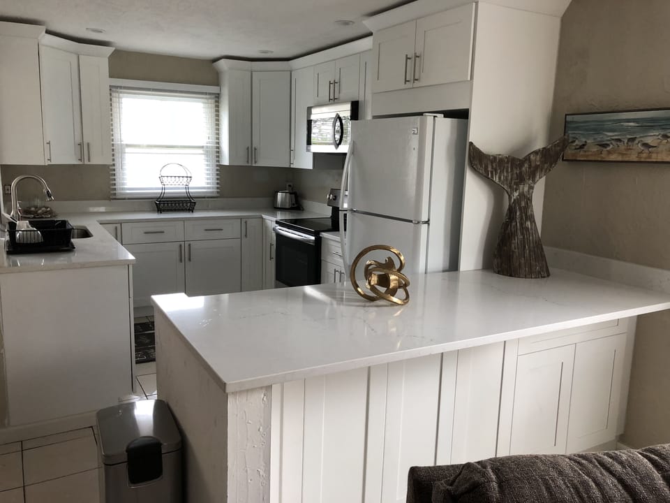 New Upscale kitchen with room for additional seating at counter
