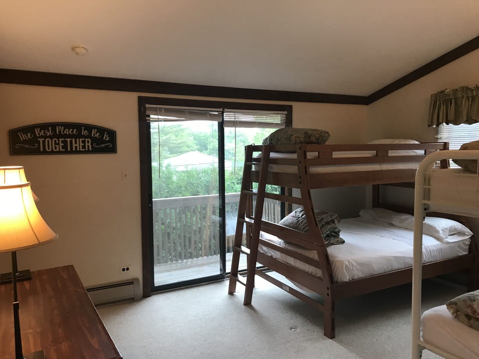 Bunk room w/Lakeview balcony - 1 full bed & 3 twins