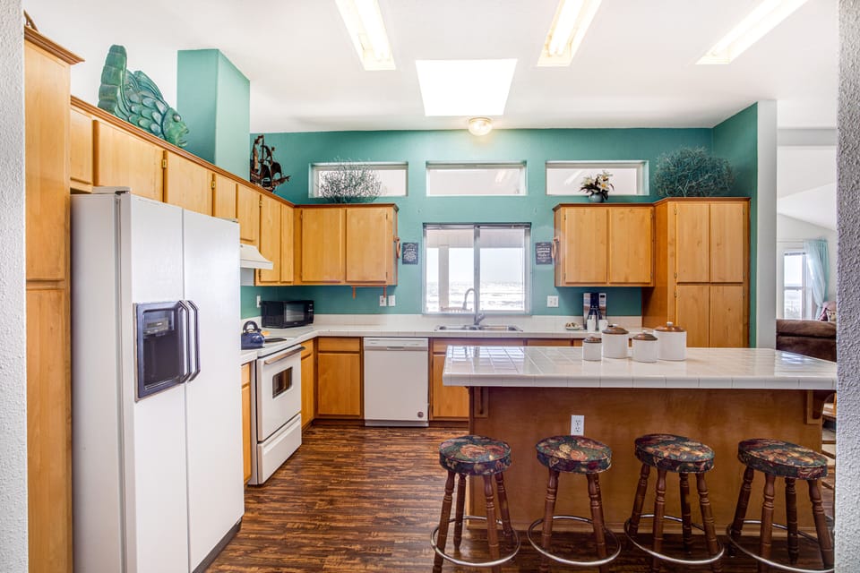 Sit and keep each other company at the kitchen island.