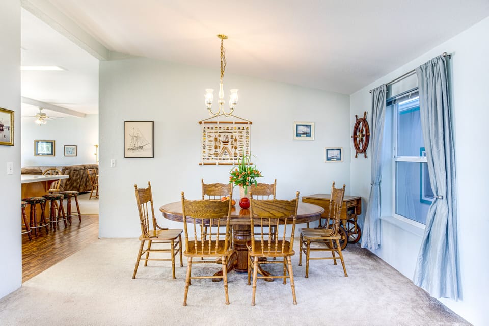 The dining room has plenty of seating for everyone with two dining tables.