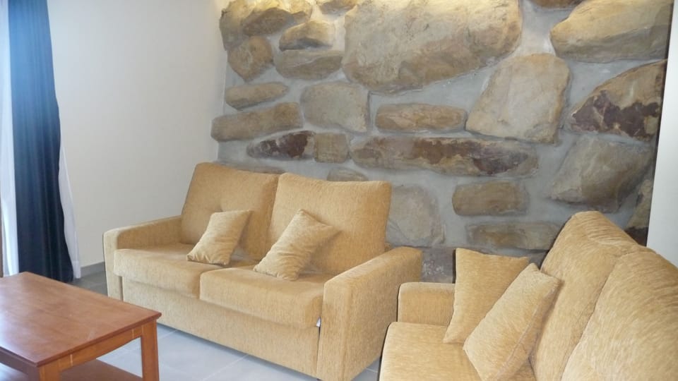 Apartment, 1 Bedroom, Terrace, Sea View | Living room | Flat-screen TV, heated floors