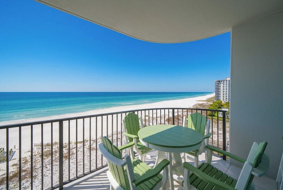 Enjoy your morning coffee from the balcony as you admire stunning beachfront views