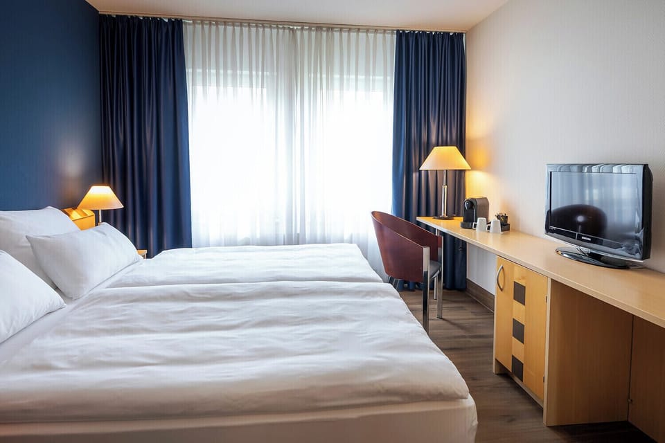 Business Double Room | In-room safe, desk, blackout drapes, iron/ironing board (on request)