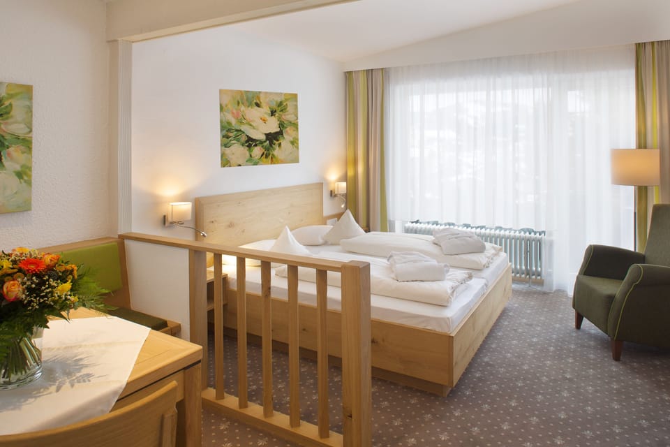 Hypo-allergenic bedding, iron/ironing board, free cribs/infant beds