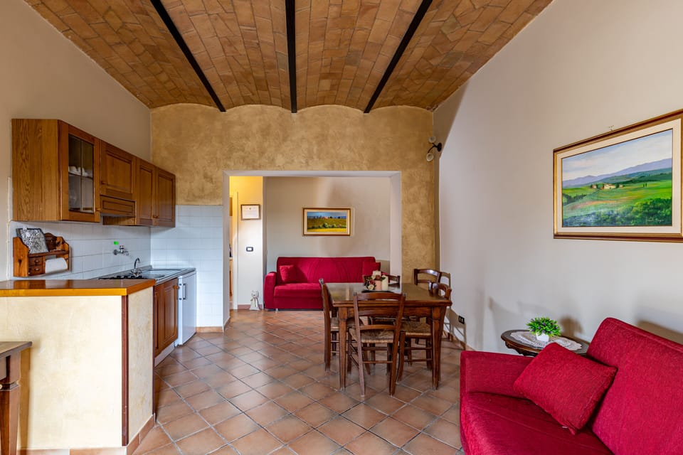 Exclusive Apartment | Living area | 22-inch flat-screen TV with cable channels, TV