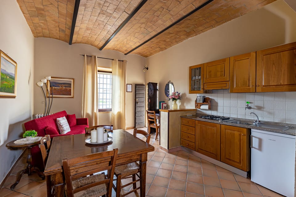 Exclusive Apartment | Living area | 22-inch flat-screen TV with cable channels, TV