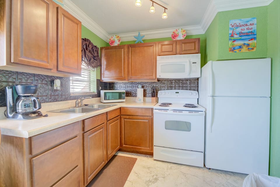A FULL KITCHEN WITH COOKING NEEDS AND MORE