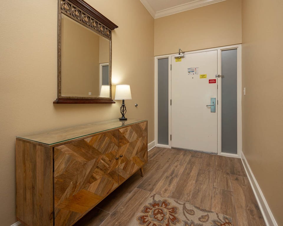 Step into a warm welcome, admiring the stylish decor as you prepare for your coastal getaway