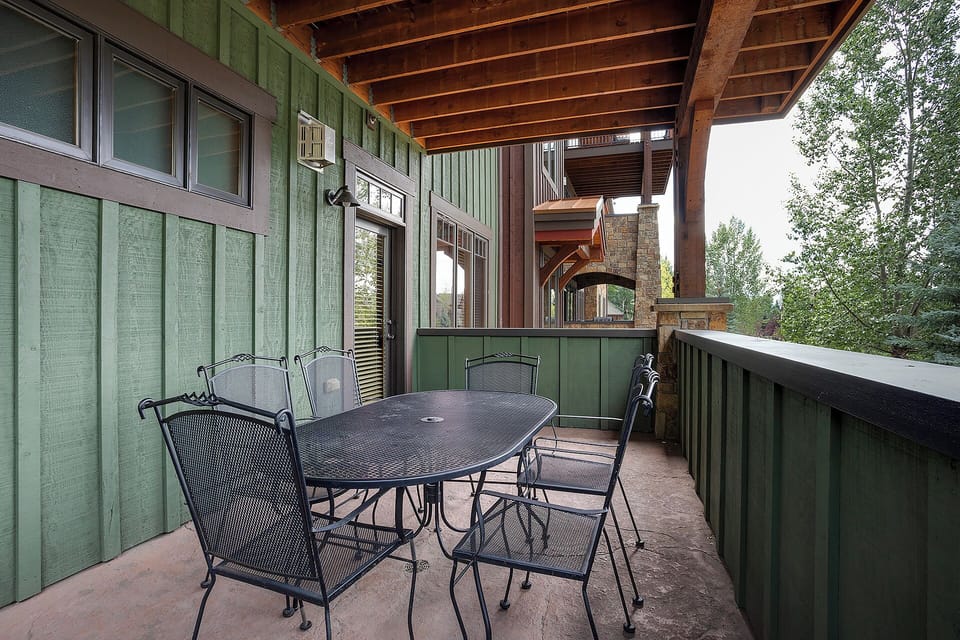 Unwind on your private balcony with mountain forest views, perfect for morning coffee or evening relaxation.