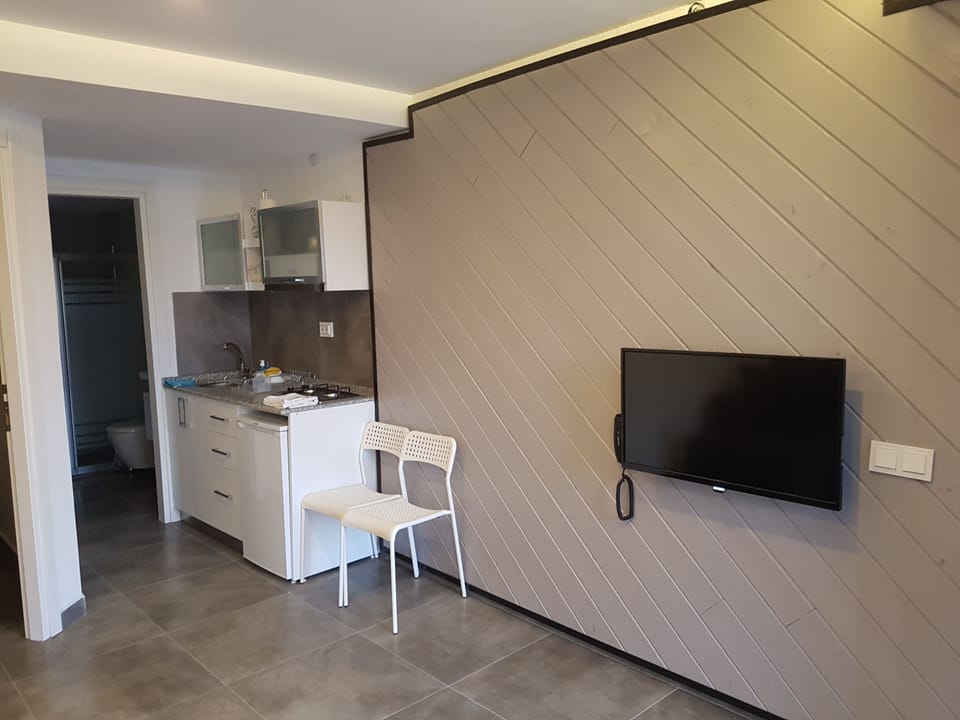 Standard Villa, 1 Bedroom, Kitchenette, Garden Area | Living room | LCD TV, table tennis