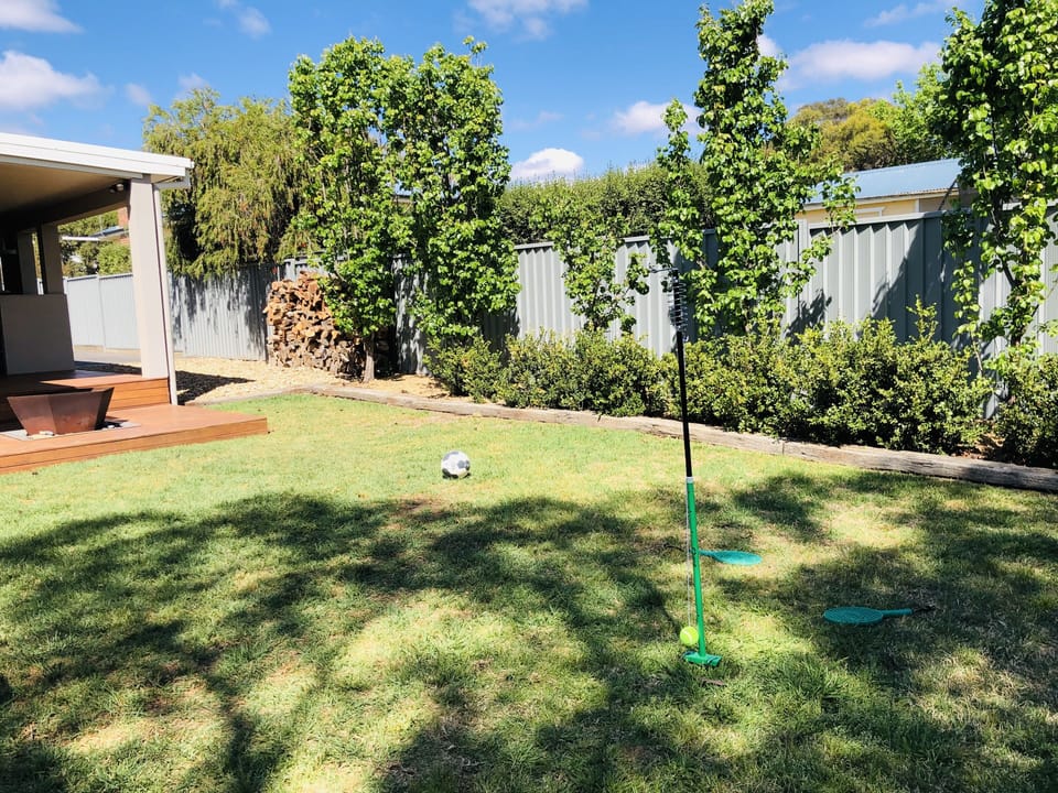 Enjoy playing games in the large, grassed rear yard
