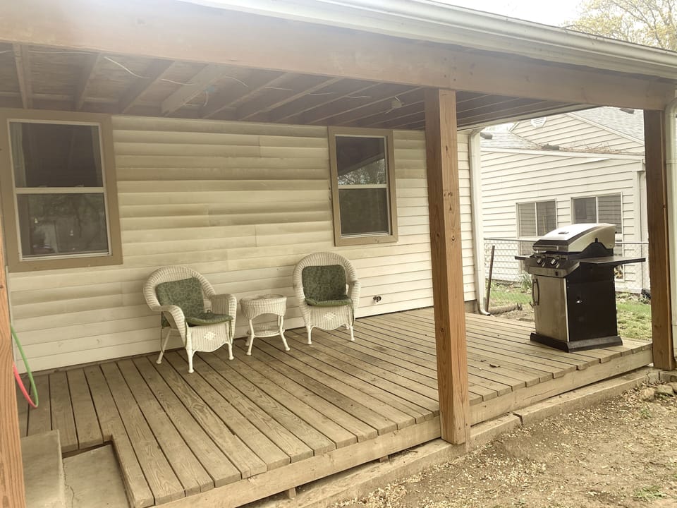 A back porch to enjoy come rain or shine.