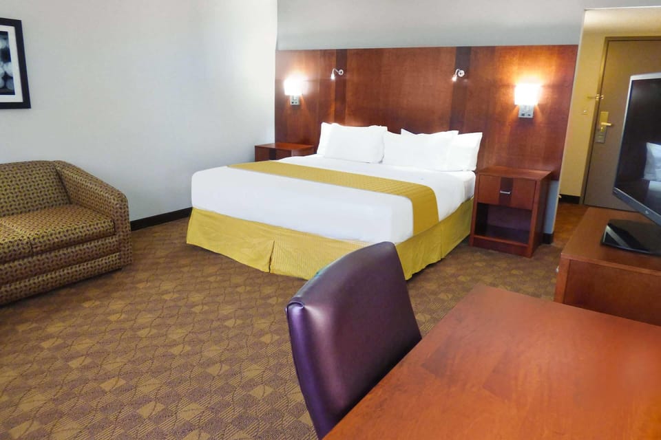 Premium bedding, desk, laptop workspace, soundproofing