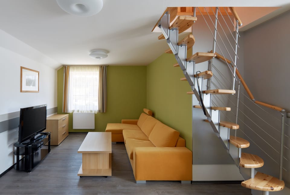 Standard Apartment, 2 Bedrooms | Living room | Flat-screen TV