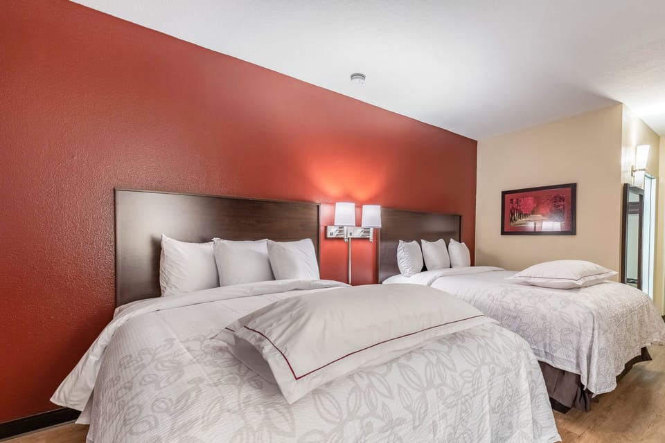 Blackout drapes, cribs (free), rollaway beds (surcharge), WiFi (free)