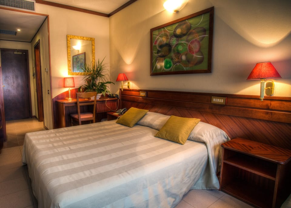 Down comforters, minibar, in-room safe, desk