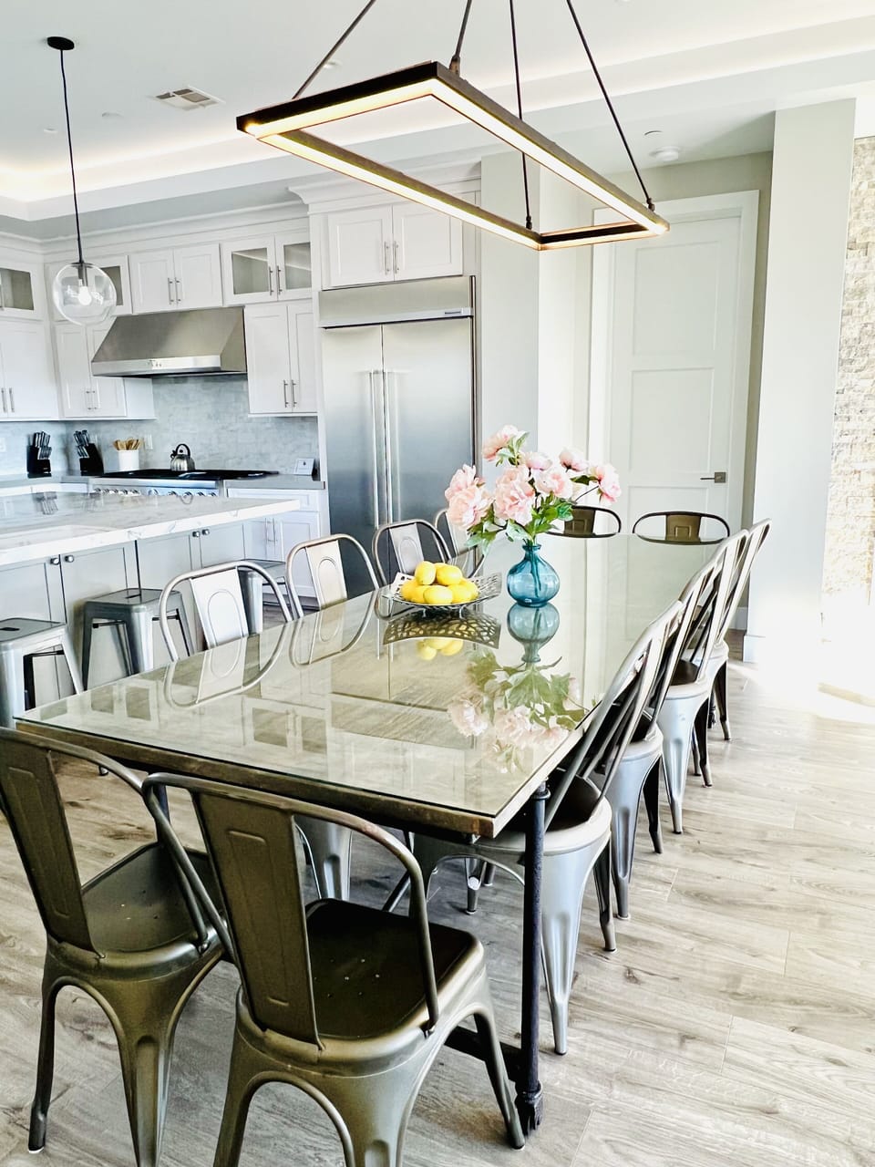 Interior dining plus nearby bar stools.