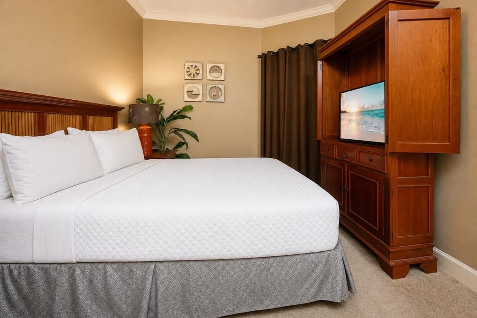 Relax on the cozy queen bed in this guest suite and stream your favorite shows after a beach day