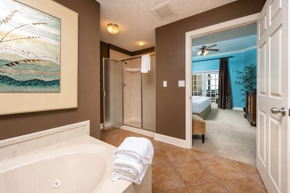 Indulge in relaxation in the master bath with a refreshing walk-in shower and soothing jetted tub