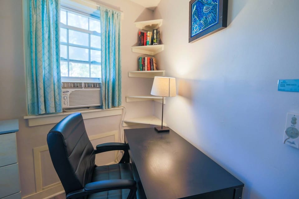 The third floor bedroom also has a desk space that is perfect for Zoom calls or a bit of work.