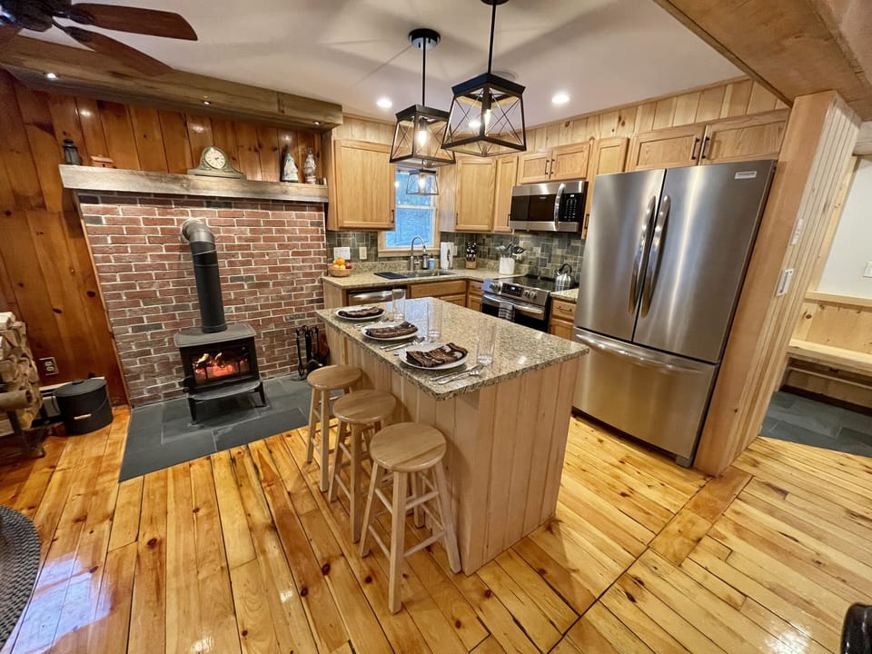 The kitchen island is a perfect place to enjoy conversation while meals are made