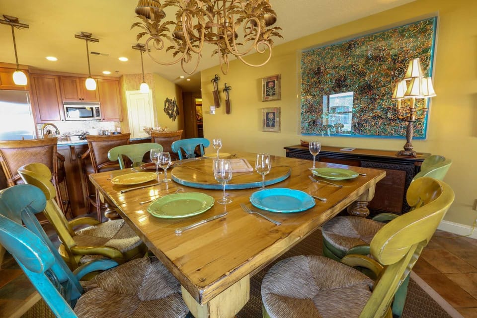 The gourmet kitchen and charming dining room are perfect for your vacation meals