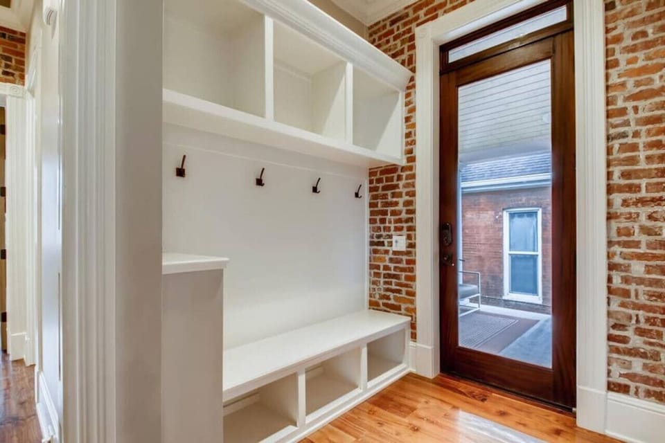 Small mudroom with exit to outdoor space